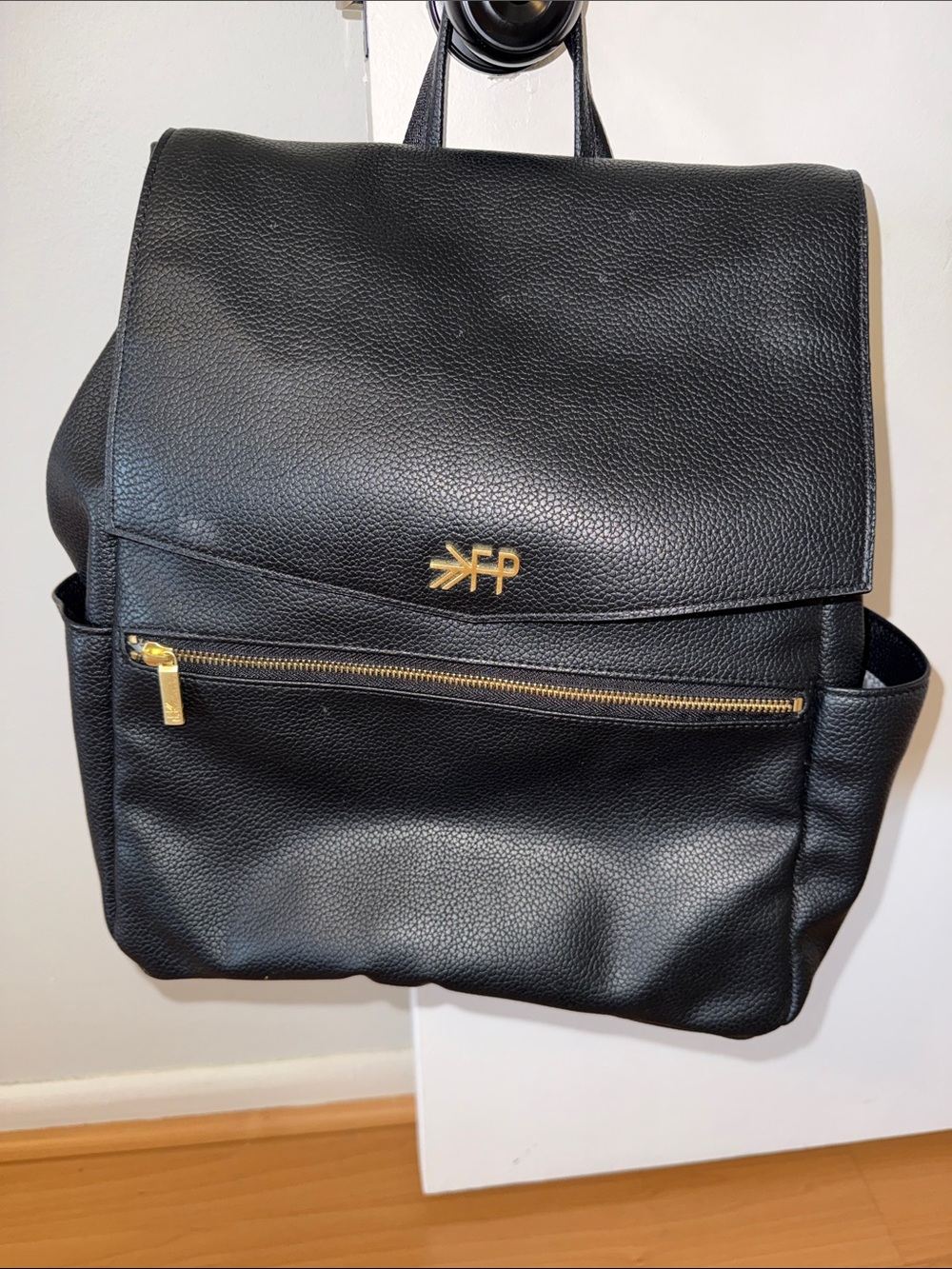 Freshly Picked Black Pebbled Leather Backpack with Gold Accents